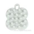 Four-leaf clover shaped silicone shampoo comb